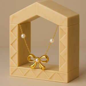 Golden bow style pendant